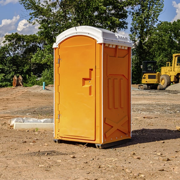 how often are the portable restrooms cleaned and serviced during a rental period in Scott